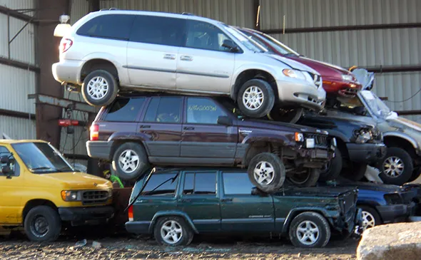 Multiple junk cars being towed in Arlington, TX