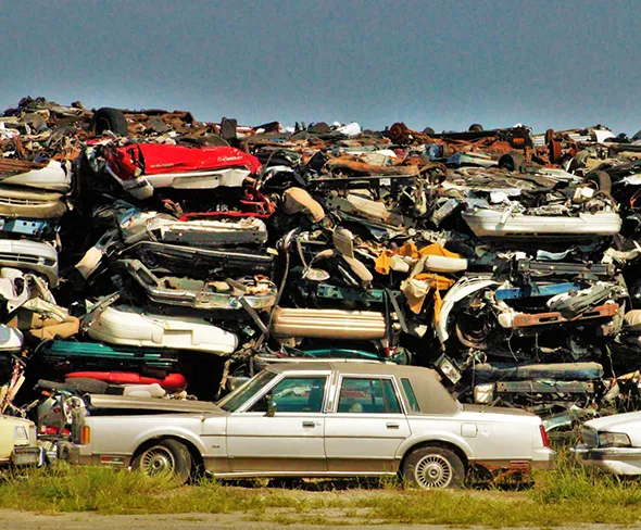Multiple junk cars lined up for removal in Red Oak, TX