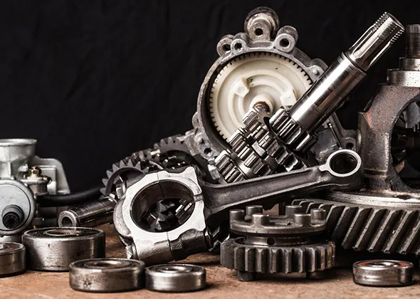 Stack of automotive parts and components for car part disposal in Carleton, TX