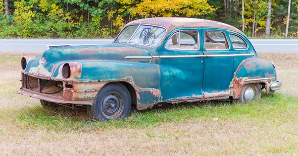 Rusty blue vintage car for quick car selling service in Midlothian TX.