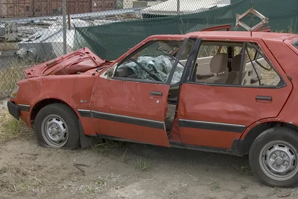 Red junk car being picked up hassle-free in DeSoto, TX