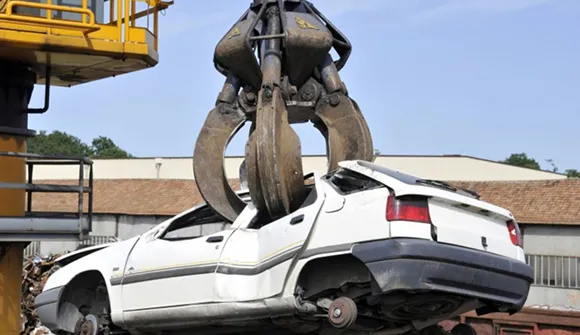White scrap car ready for removal in Midlothian, TX